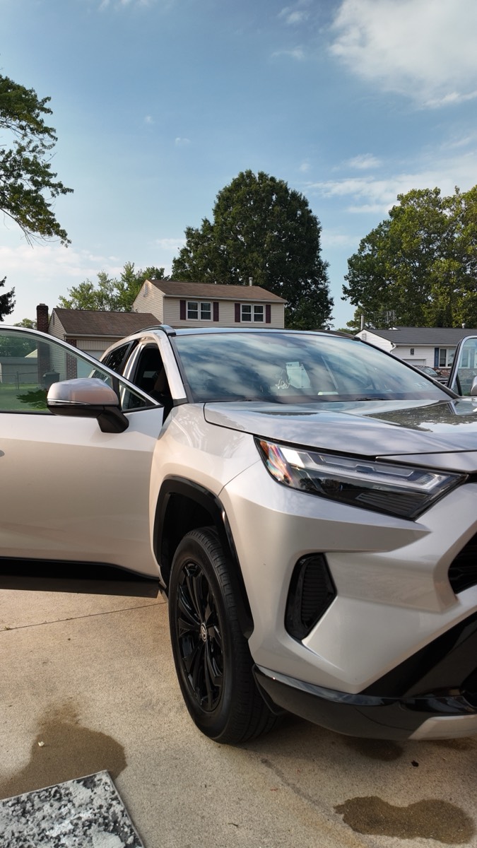 Silver Toyota RAV4 after an exterior wash and wheel clean