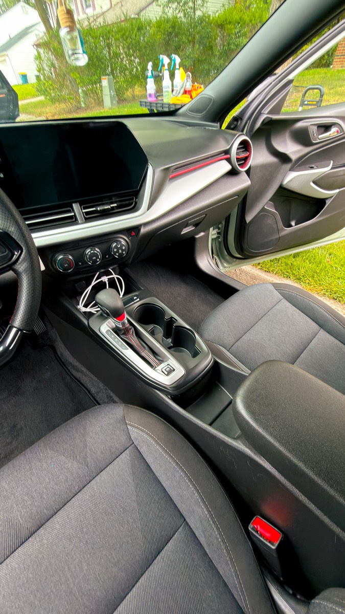 Clean Chevrolet Trax cabin — console, shifter and passenger seat